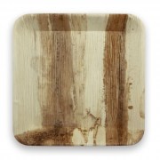 Assiette écologique en feuille de palmier 24 cm, rigide et biodégradable, idéale pour traiteurs et événements.